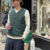 antwerp man in bottle green v-neck vest